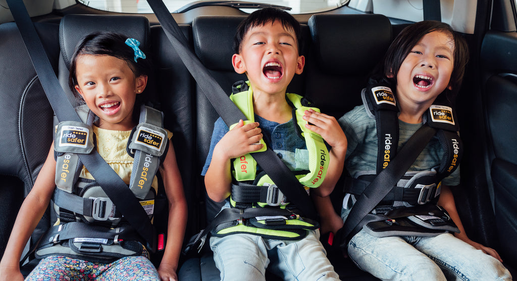 Taking Grab with my two toddlers - what are my portable restraint options?